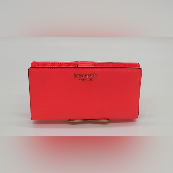 kate spade Handbags - Kate Spade Cameron Street Stacy Large Slim Bifold Wallet in Surprise Coral